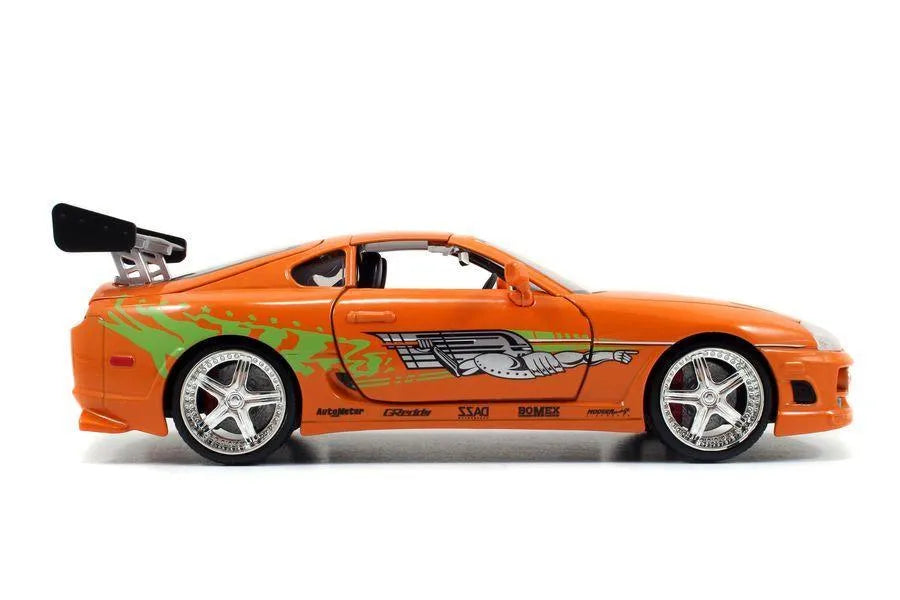 JAD30738 Fast and Furious - 1995 Toyota Supra 1:24 with Brian Hollywood Ride - Jada Toys - Titan Pop Culture