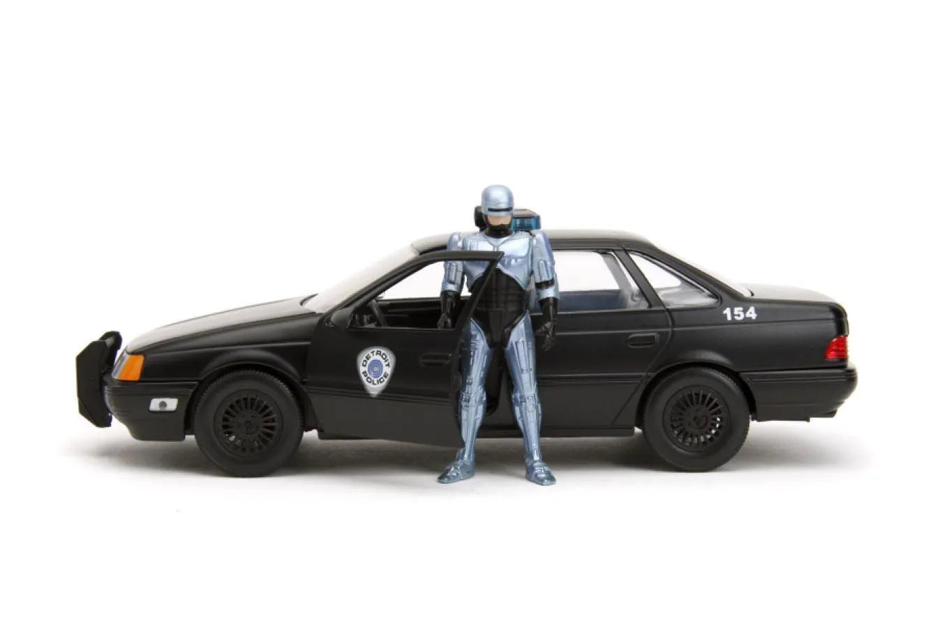 JAD33743 Robocop - 1986 Ford Taurus with Robocop 1:24 Scale Set - Jada Toys - Titan Pop Culture