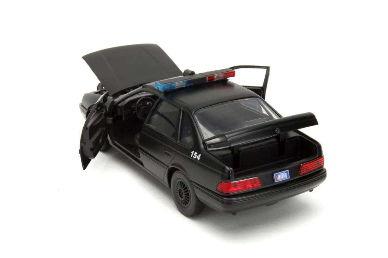 JAD33743 Robocop - 1986 Ford Taurus with Robocop 1:24 Scale Set - Jada Toys - Titan Pop Culture